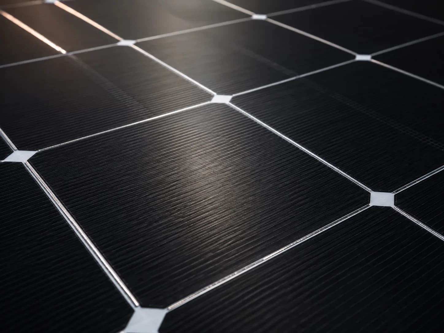Illustrative close-up of a solar panel cell grid, used for Fíor Solar's understanding solar power page